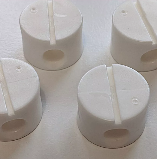 Photo of a set of IKEA plastic nut holder fittings – Trysil bed – WHITE – 128437